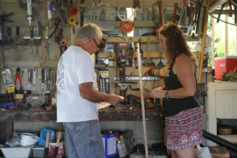 Melanie and fisherman Geoff Walker build shark tagging poles to give out at the workshop - photo © NOAA Fisheries / Ali Bayless