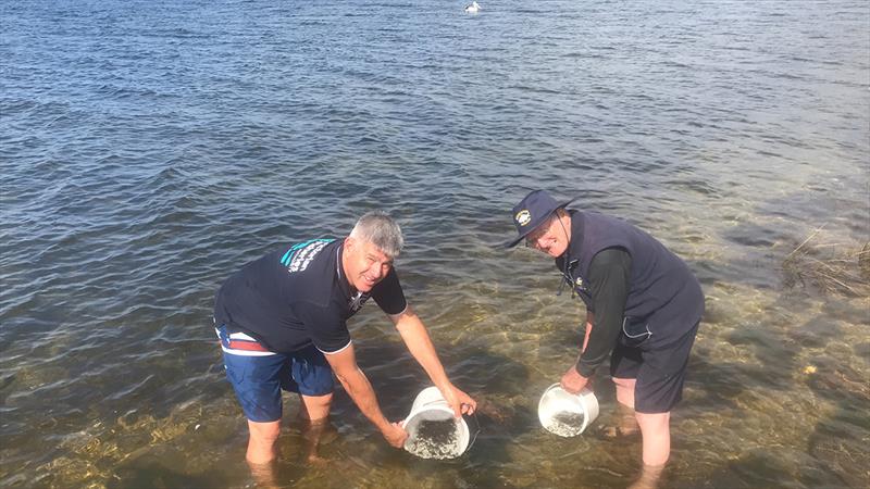 Two men with bucket in river: Craig Ingram and Don Cunningham at Bemm River  photo copyright Sarah Hetherington taken at  and featuring the Fishing boat class