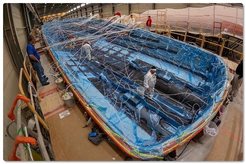 Resin continues to be drawn outboard and up the hull sides photo copyright Viking Yachts taken at  and featuring the Fishing boat class