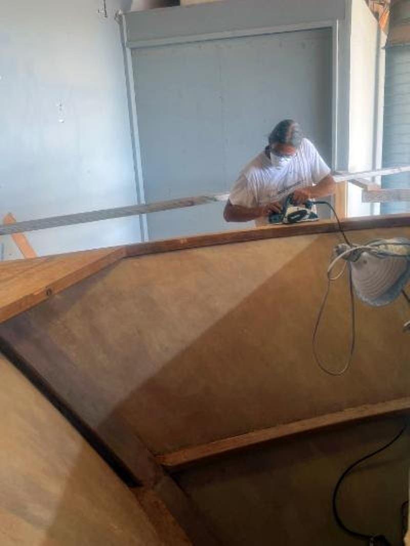Hull #8 Beveling the sheer clamp - photo © Michael Rybovich & Sons