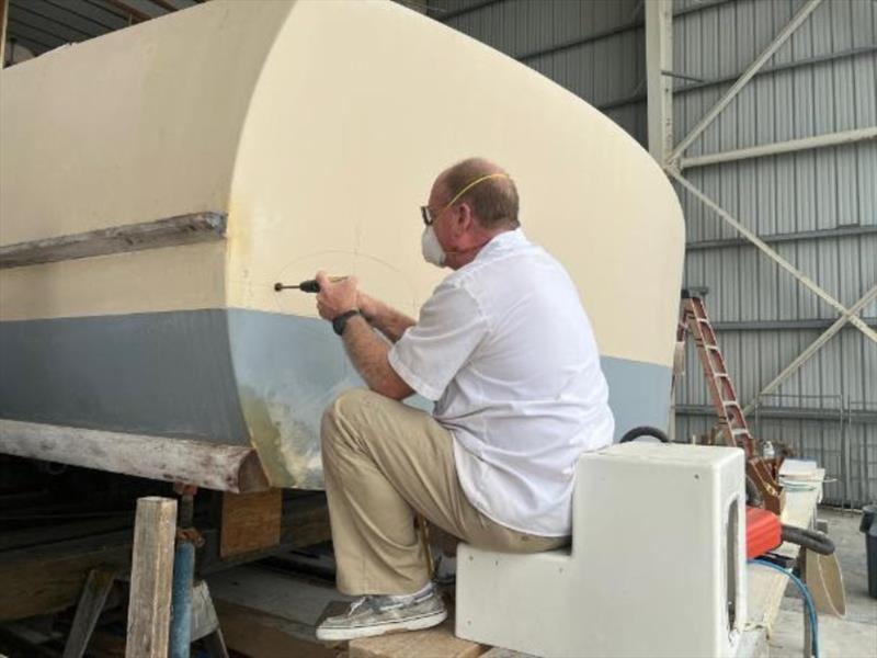 Hull #8 - Brian cutting in exhaust tubes - photo © Michael Rybovich & Sons