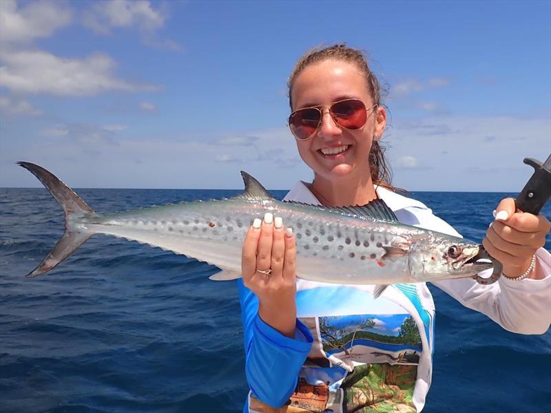 All smiles here and some spotted mackerel for dinner - photo © Fraser Guided Fishing