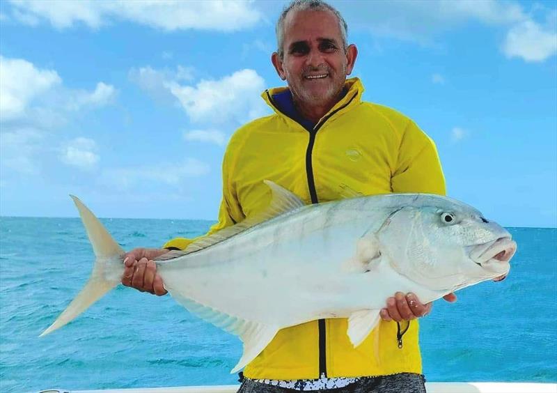 A solid golden trevally caught with the crew from Hot Reels Pro Fish Charters - photo © Fisho's Tackle World