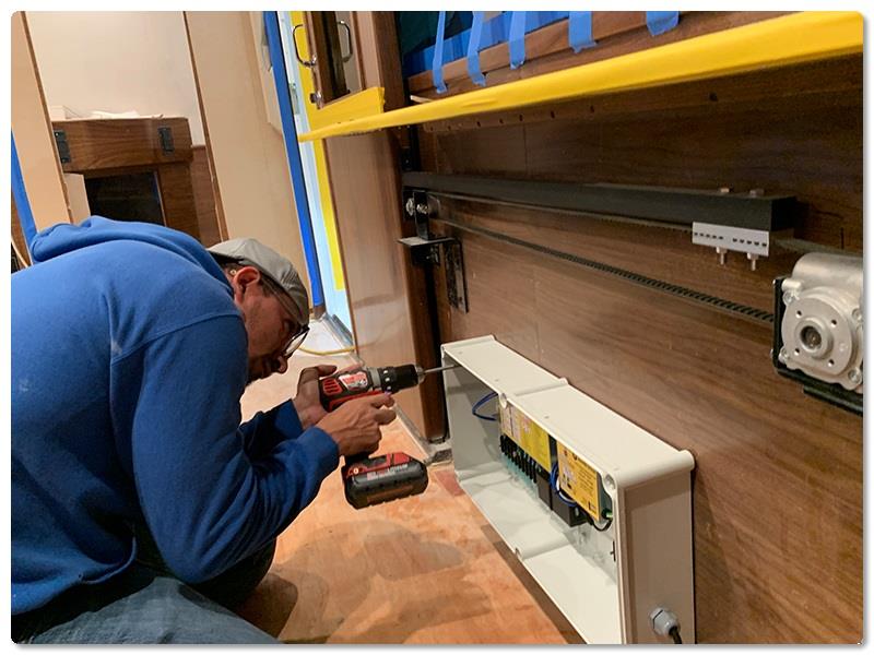 Finish Electrician Carlos Hernandez installs the automatic control box - photo © Viking Yachts