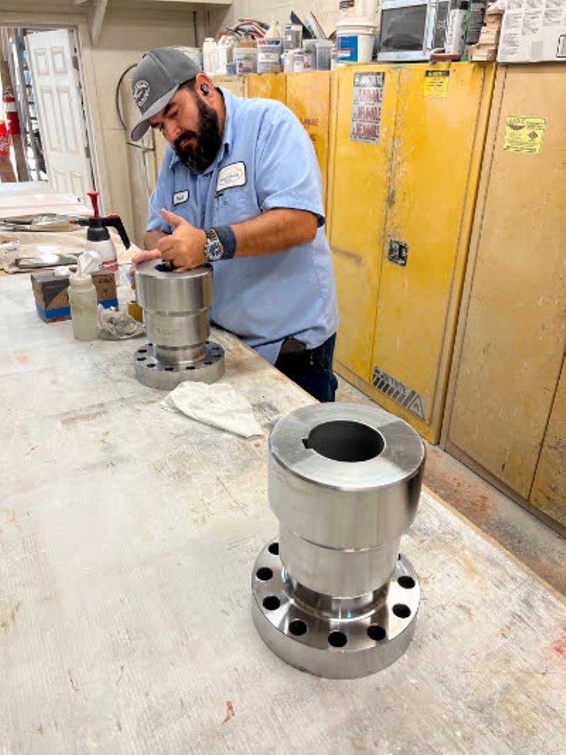 Hull #7 - Frank prepping shaft couplings - photo © Michael Rybovich & Sons