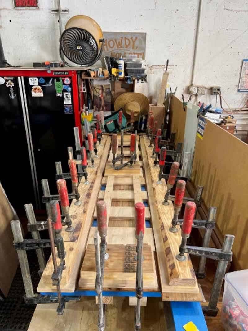 Hull #7 - Salon door veneer installation - photo © Michael Rybovich & Sons