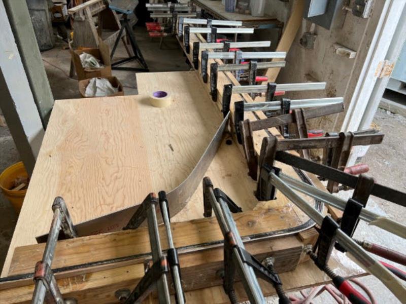 Hull #8 - Mezzanine toe kick lamination - photo © Michael Rybovich & Sons