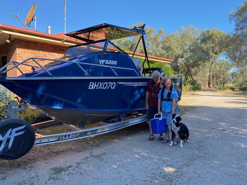 Philip and Olivia Hanel are pictured in their new Crewsaver lifejackets alongside their new boat and advise to keep your lifejacket on at all times when on the water - photo © Survitec