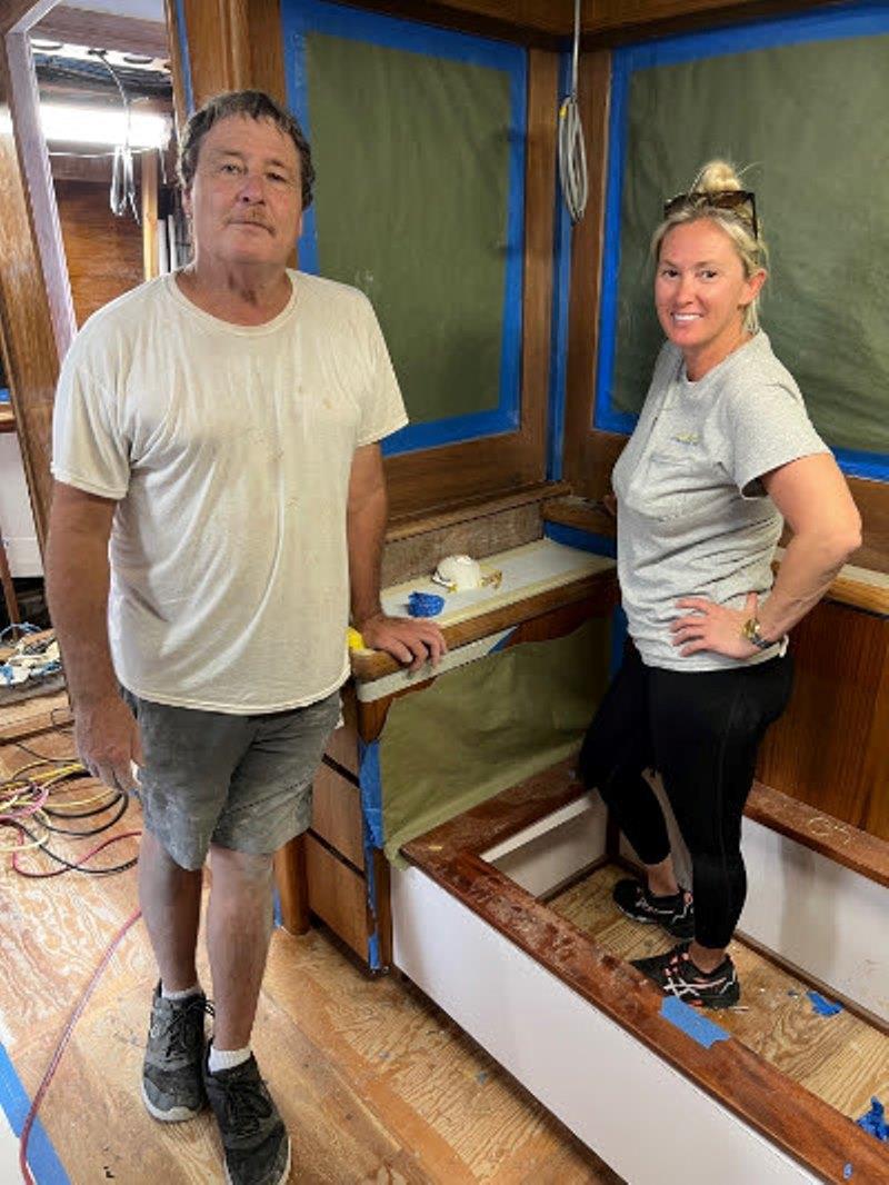 Hull #7 - Clarke and Cheryl Ann prepping for finish satin - photo © Michael Rybovich & Sons