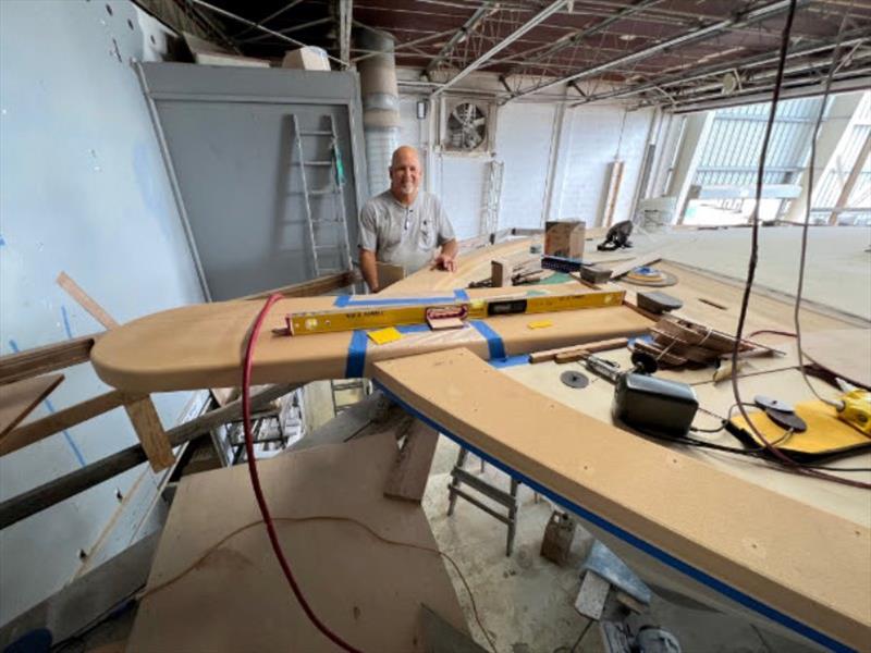 Hull #8 - Mike M on pulpit and toe rail - photo © Michael Rybovich & Sons