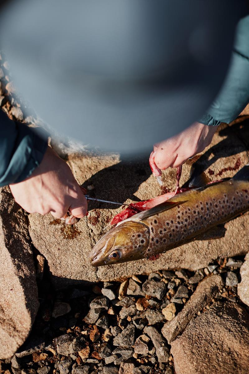Fish can be found hard on the edge on the rocky shores of Great Lake photo copyright Spot On Fishing Hobart taken at  and featuring the Fishing boat class