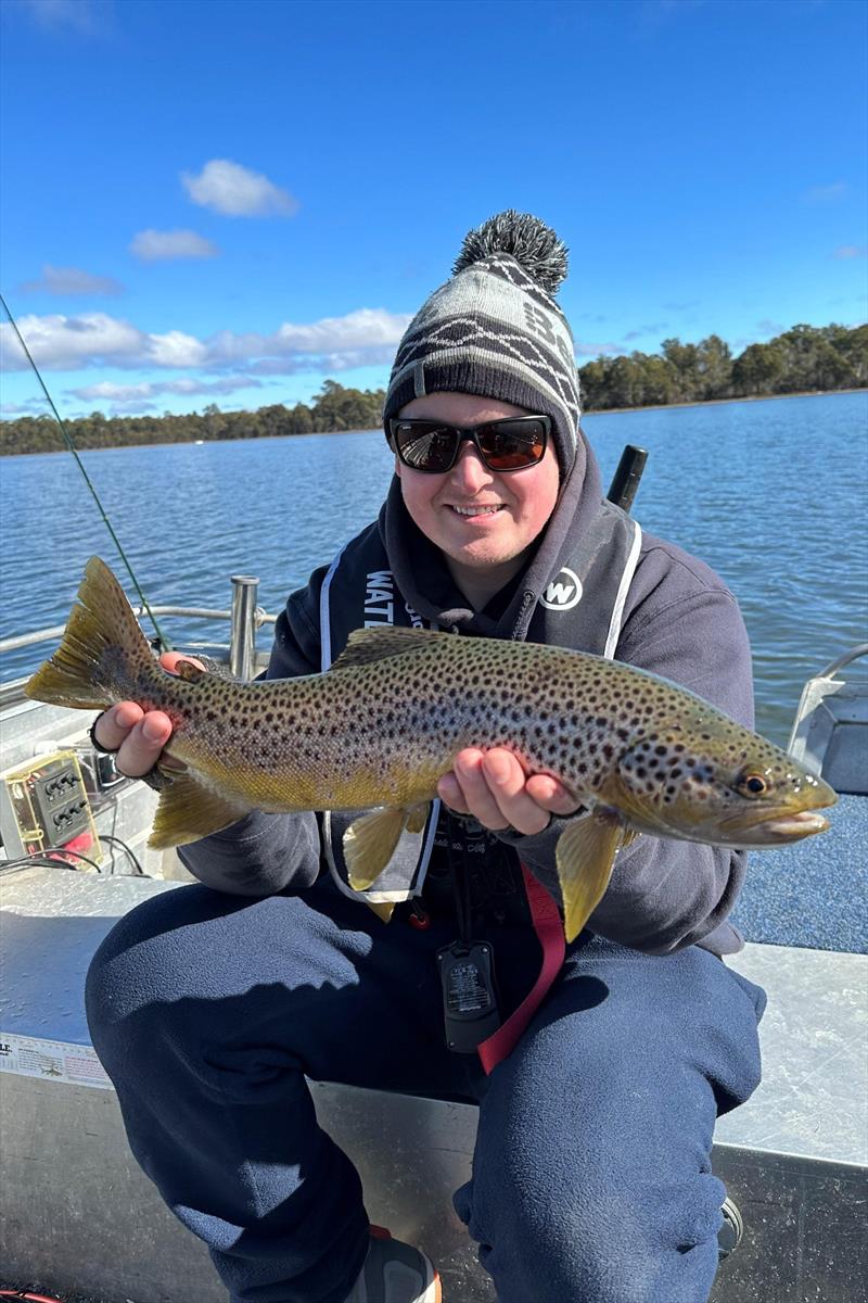 Greeny sneaking out between changing nappies to snag a few on Penstock photo copyright Spot On Fishing Hobart taken at  and featuring the Fishing boat class