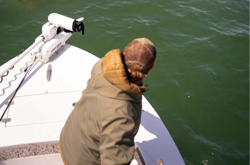Angler Jake Groff makes a backcast with the TFO Blitz in an attempt to catch a large bull red on the fly photo copyright Tom Wetherington taken at  and featuring the Fishing boat class