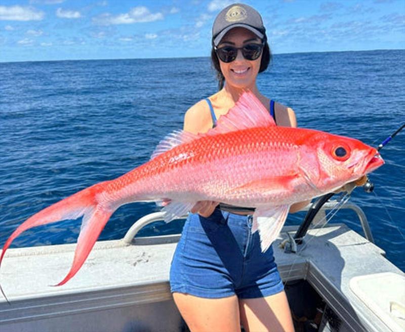 Bree with one of the most photogenic fisho from the depths. Nice flamie Bree, and superb weather too photo copyright Fisho's Tackle World taken at  and featuring the Fishing boat class