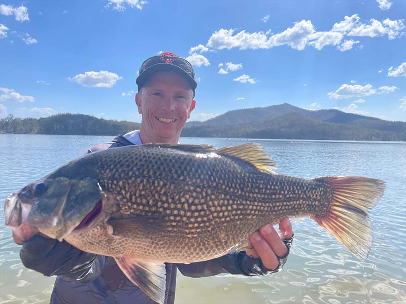 Chesley with two kilogram-plus bass - photo © Mercury Marine