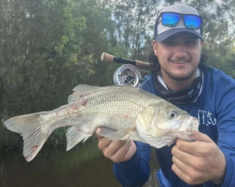 Reegan spent a day in the fresh and scored this nice bass on fly - photo © Fisho's Tackle World