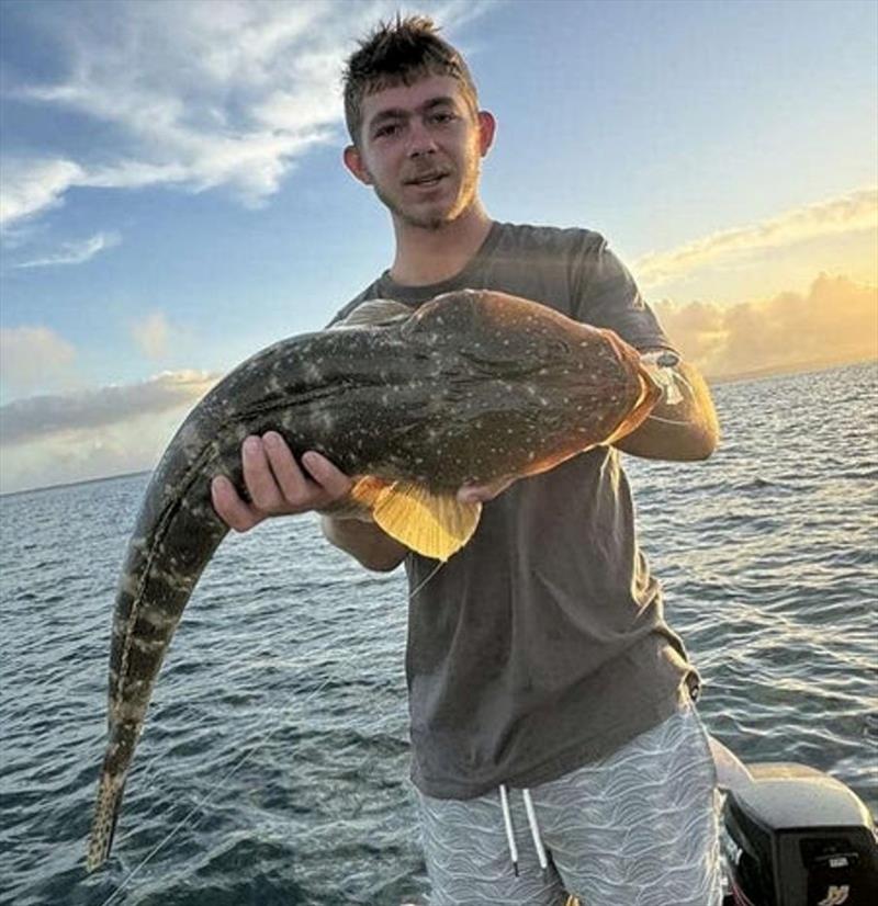 Brodie caught this thumping big flathead this week. Recent rains have them turning up all over the place - photo © Fisho's Tackle World
