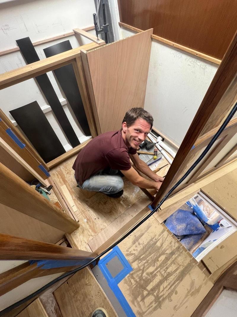 Hull #8 - Dan in the utility room - photo © Michael Rybovich & Sons