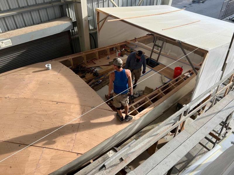 Hull #10 - Flipper fitting foredeck - photo © Michael Rybovich & Sons