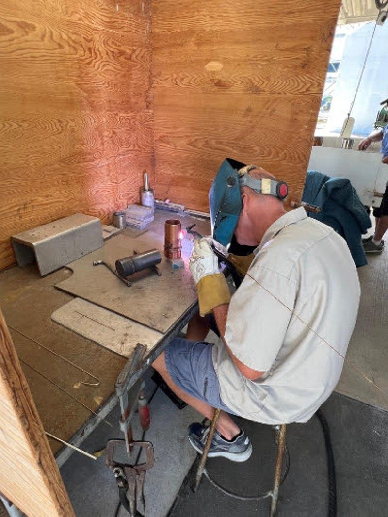 Hull #9 - Bill welding engine raw water plumbing photo copyright Michael Rybovich & Sons taken at  and featuring the Fishing boat class