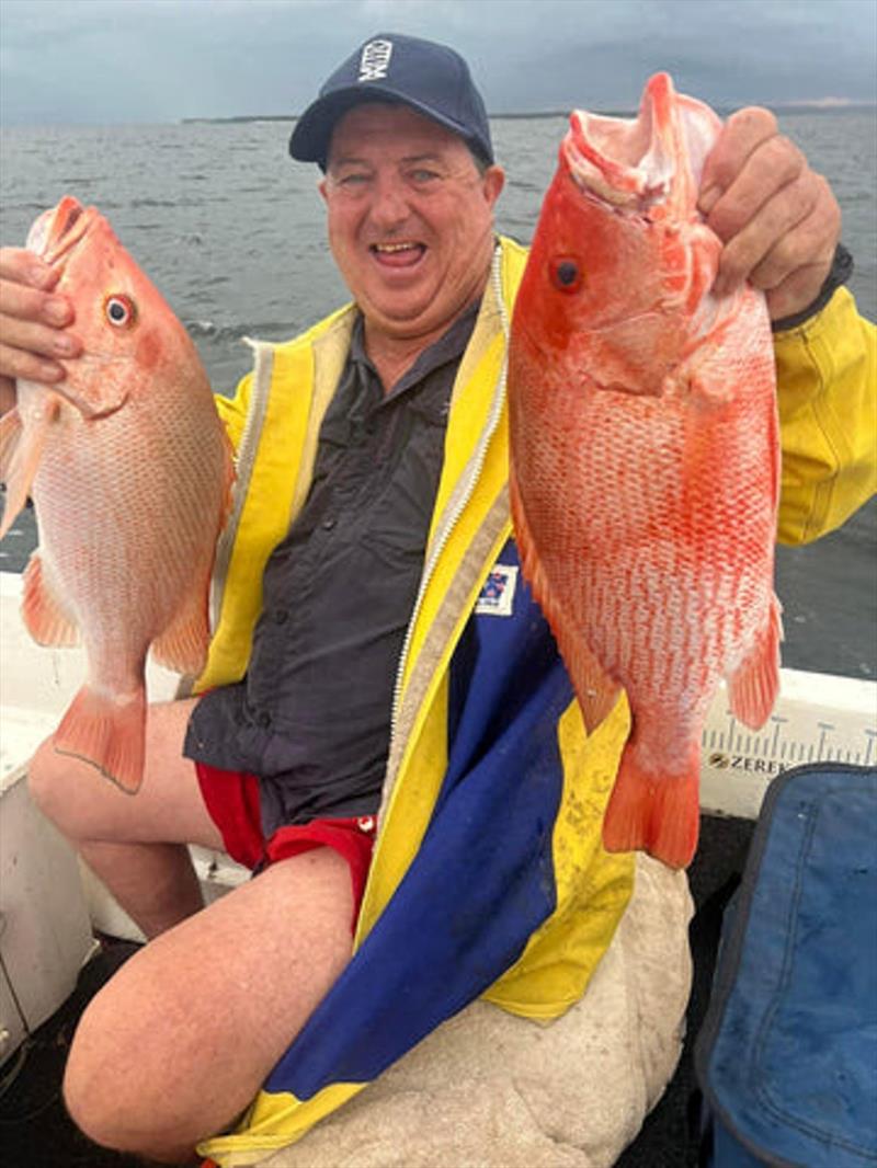 Scarlets continue to feature in reef fish catches from all over the bay. Here's Jeff with a couple of tasty morsels for the Easter seafood banquet - photo © Fisho's Tackle World