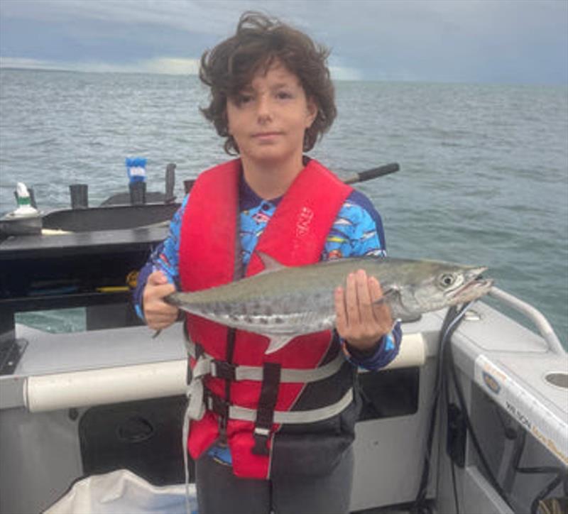 Young Archer caught this mackerel, and also tuna, whilst fishing out in the bay photo copyright Fisho's Tackle World taken at  and featuring the Fishing boat class