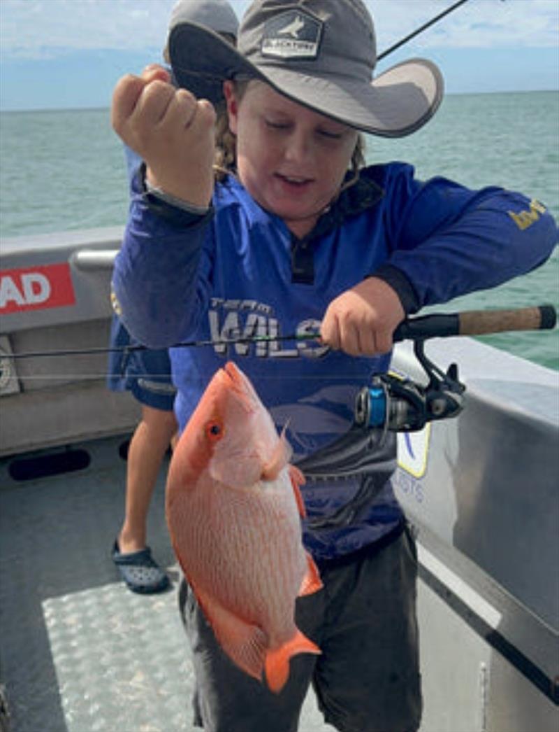 Olly Pearce with his first scarlet (nannygai). The rod work from this young lad on a noodle stick is as good as you will see - photo © Fisho's Tackle World