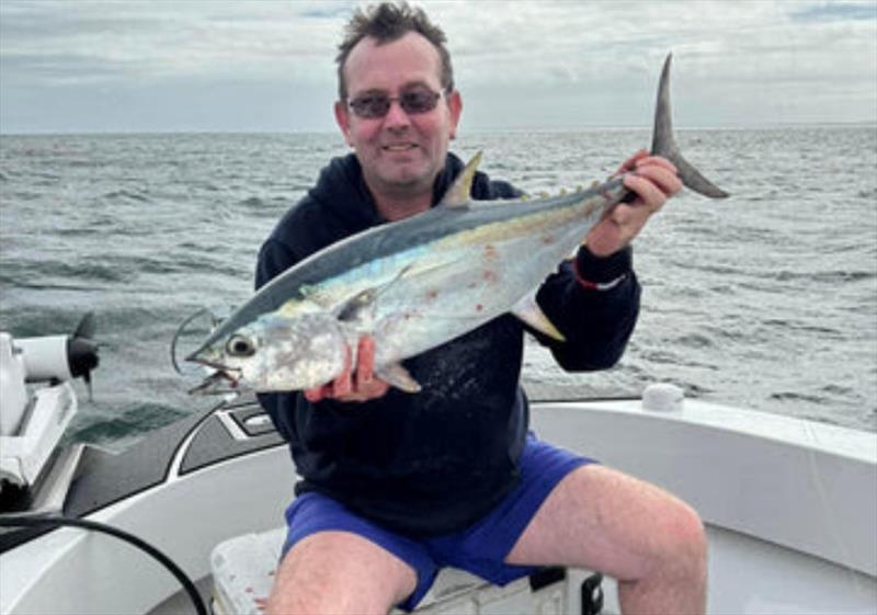 Tony Midson was happy catching school longtails recently. Better weather this week will see many folks out there chasing them again - photo © Fisho's Tackle World
