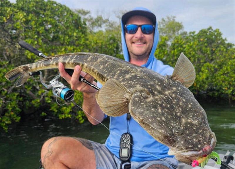 Staff member, Jacko, with a thumper flatty that went 82cm, caught on a pimped-up Rapala Crush City Imposter - photo © Fisho's Tackle World