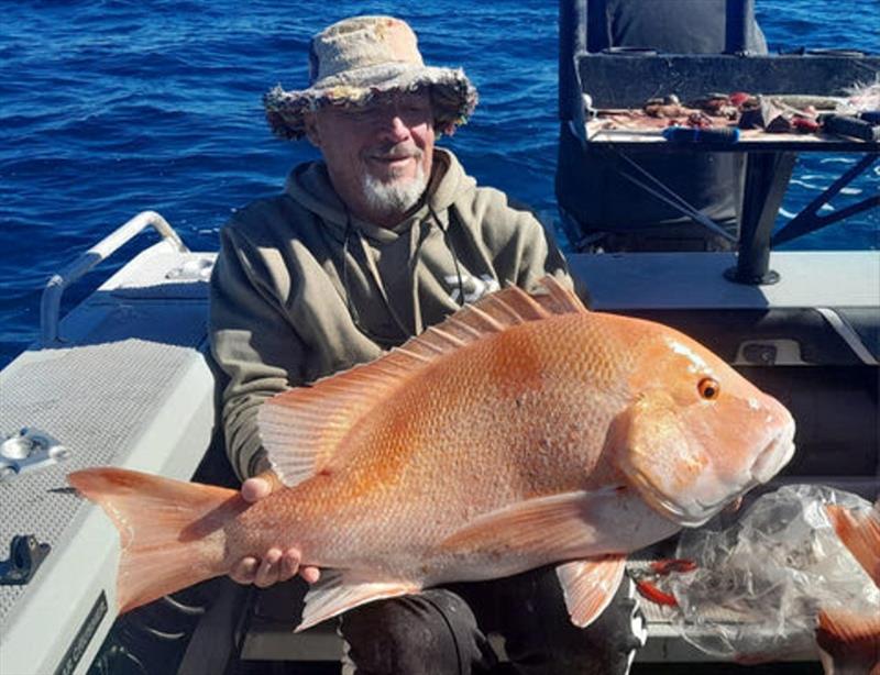 Darrel with a thumper red emperor from off Stanage Bay photo copyright Fisho's Tackle World taken at  and featuring the Fishing boat class