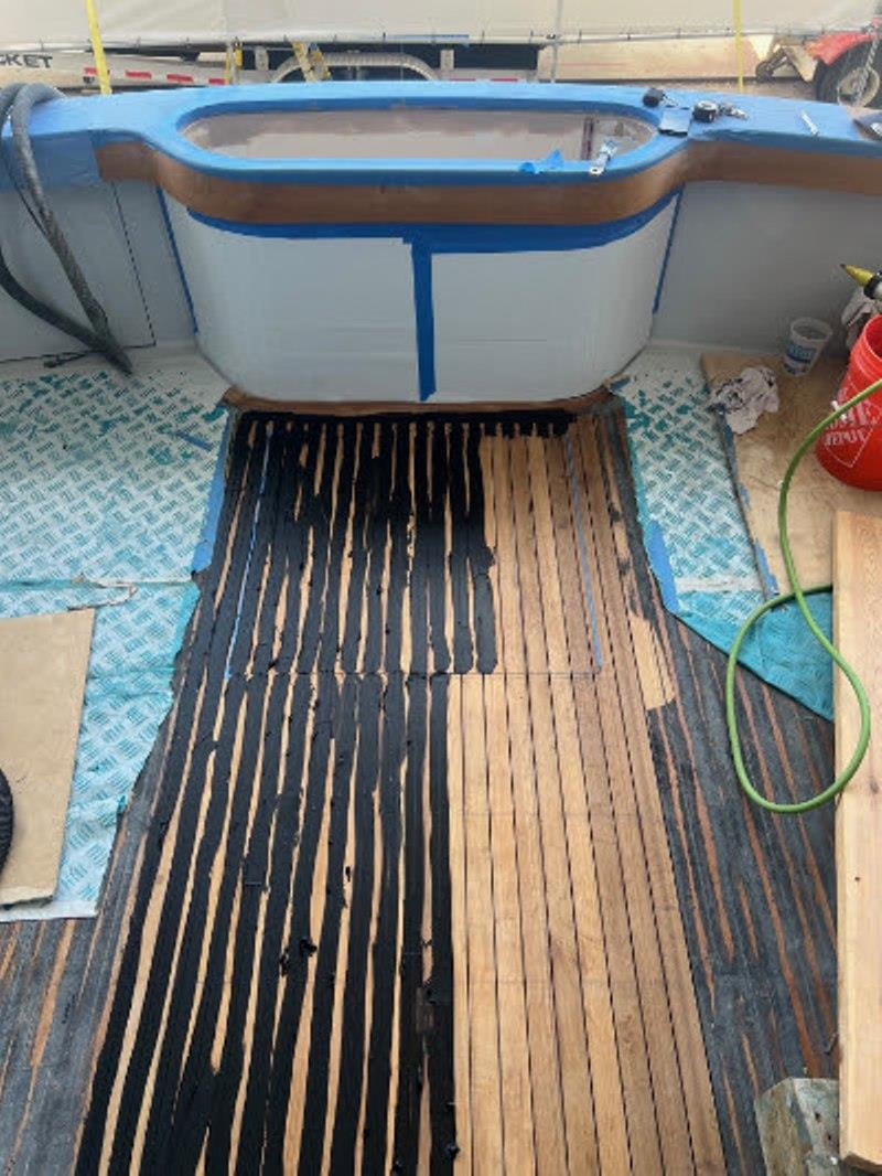 Hull #8 - Caulking deck planking - photo © Michael Rybovich & Sons
