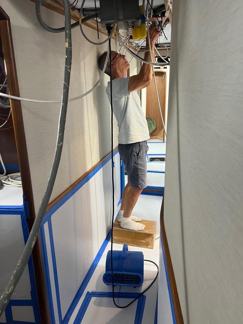 Hull #8 - Mark wiring companionway - photo © Michael Rybovich & Sons