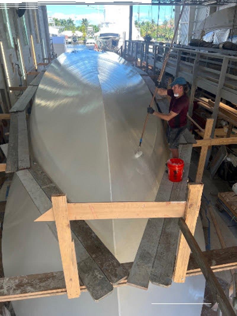 Hull #11 - Applying resin coats - photo © Michael Rybovich & Sons