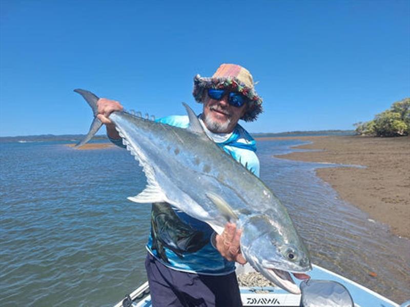 Darrel with a fine queenfish caught working the flats. This is perhaps the best time of year for flats fishos so get out there and into 'em photo copyright Fisho's Tackle World taken at  and featuring the Fishing boat class