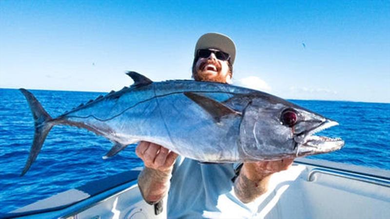 Brett with a scrappy little dogtooth tuna from east of Breaksea Spit. Proof there are doggies out there, somewhere photo copyright Fisho's Tackle World taken at  and featuring the Fishing boat class