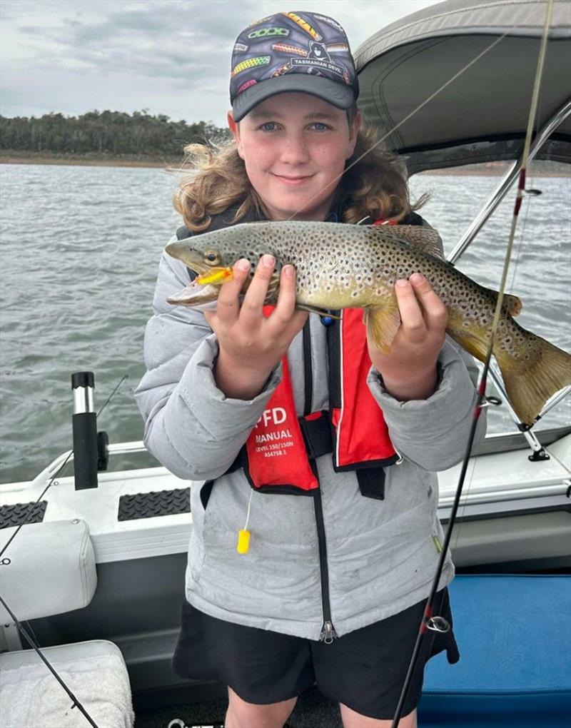 Charlie with another brown falling to the MOJO24 - photo © Spot On Fishing Hobart