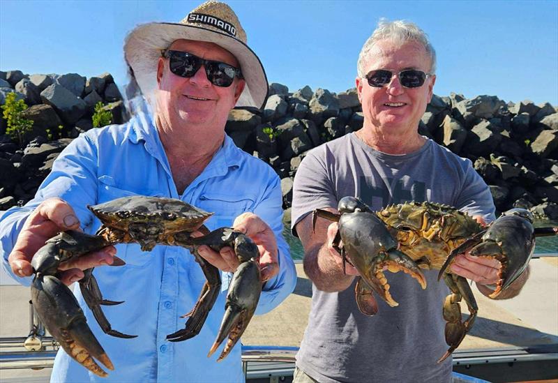 Wayne and his mate with a couple of big bucks caught in the chill of winter - photo © Fisho's Tackle World Hervey Bay