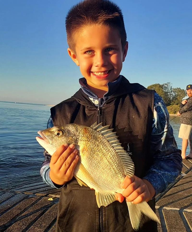 Young Kingy Ridgeway is a master bream fisho in the making. He regularly catches big bream shore-based such as this one - photo © Fisho's Tackle World Hervey Bay