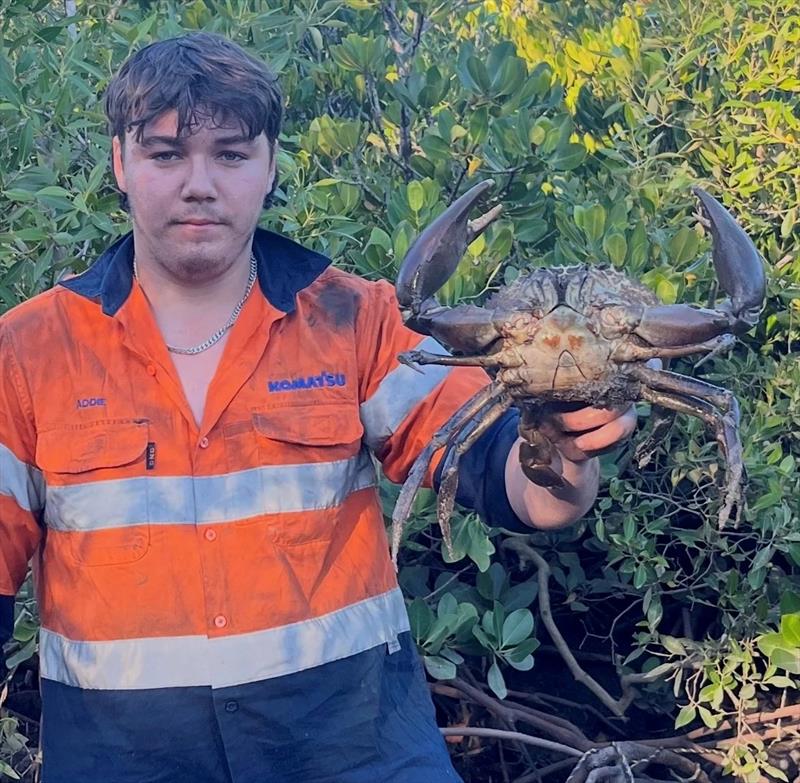 You can still catch muddies in mid-winter. You might have to get a bit muddy yourself though, just like Addie did - photo © Fisho's Tackle World Hervey Bay