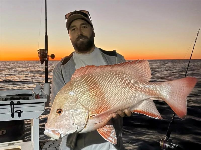 Aedan often does the big miles to catch ripper reds like this one. Looks like they will be safe this week though photo copyright Fisho's Tackle World Hervey Bay taken at  and featuring the Fishing boat class