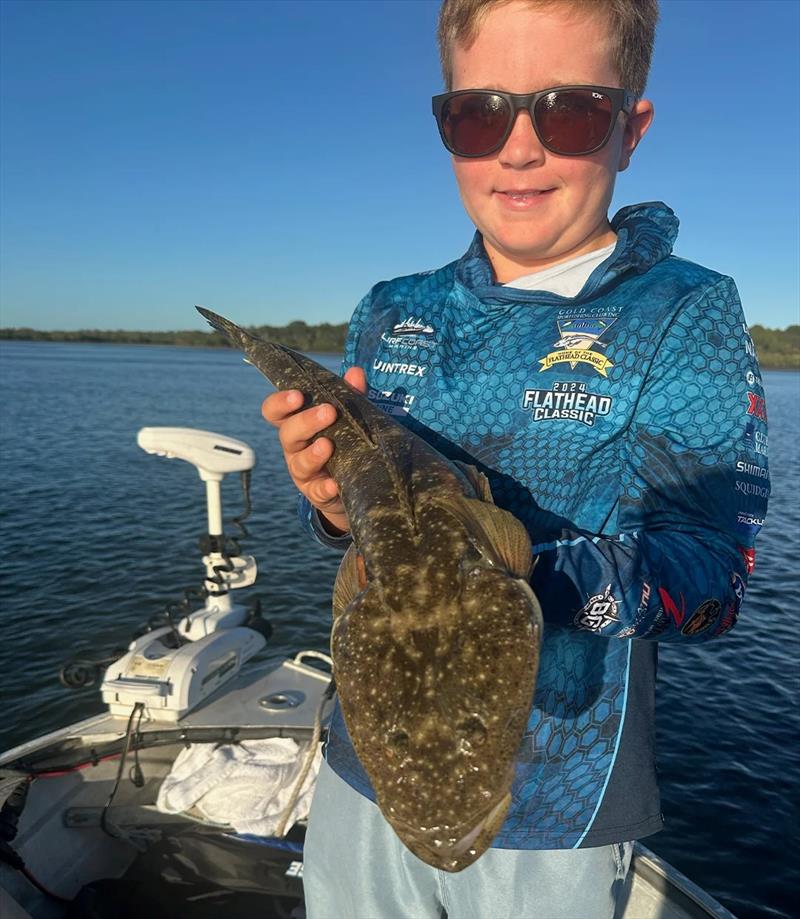 Flathead don't stand a chance when Ollie is nearby flicking lures - photo © Fisho's Tackle World Hervey Bay