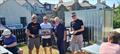 (l-r) Stewart Harrison, winning helm, Flying Fifteen Northern Championship, Shane McCarthy, Commodore Portaferry Sailing Club, John McAlea, Race Officer and Conor, winning crew Flying Fifteen Northern Championship © Ben Mulligan