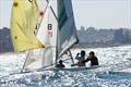 Keeping the kite full. Chris Kloppenburg and Patrick Harris are seen surfing a swell with the spinnaker up during a previous Flying 15 Nationals. Harris sailing with Kriek will be on the prowl for their 14th title at this year's Flying 15 Nationals © Sophie Thompson