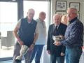Keith Poole (l) and Ian Mathews (r) collect the Gerry Dunleavy Trophy as winners of the 1st Race at the Championship of Ireland and the Jack Roy Trophy for the first Dun Laoghaire boat overall &copy; Cormac Bradley