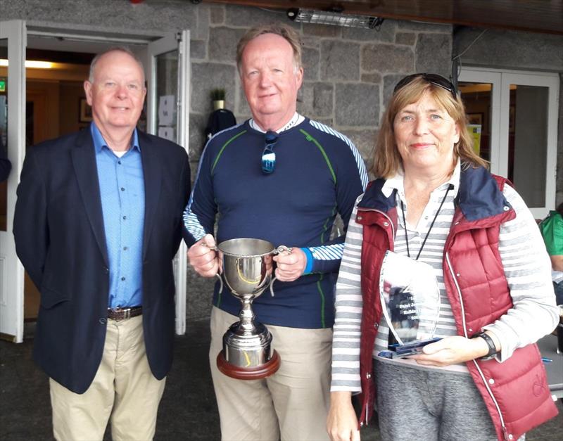 Niall Coleman (centre) and Susan Halpenny winners of the Flying Fifteen Facet Trophy presented by Facet Jeweller's Pat Shannon photo copyright Cormac Bradley taken at Dublin Bay Sailing Club and featuring the Flying Fifteen class