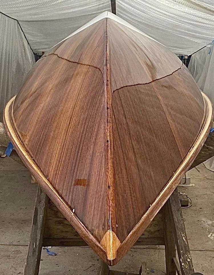 Gilmac restoration - varnishing the bottom - photo © Angus Richardson