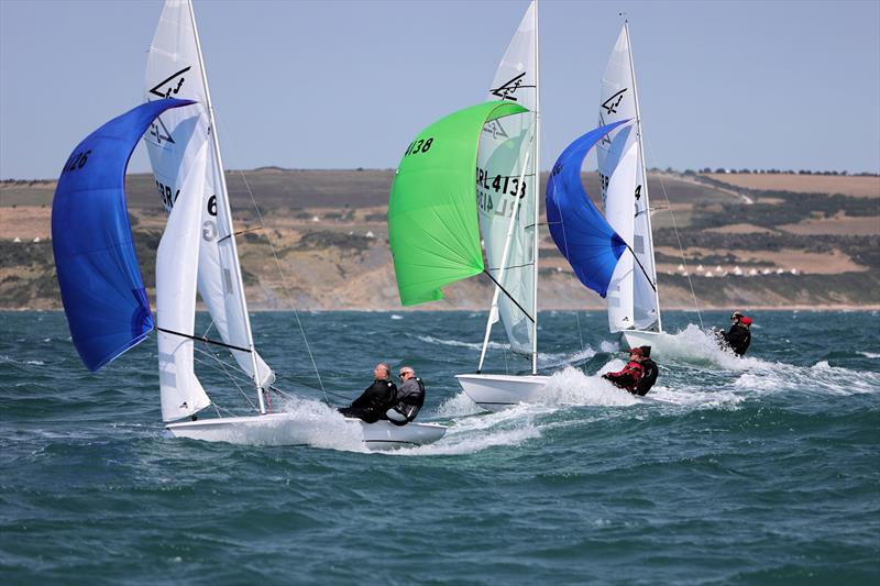 Race 3 - GBR 4126, IRL 4138, GBR 3886 reach to the finish on day 2 of the 2025 Flying Fifteen Worlds at the WPNSA - photo © Mark Jardine