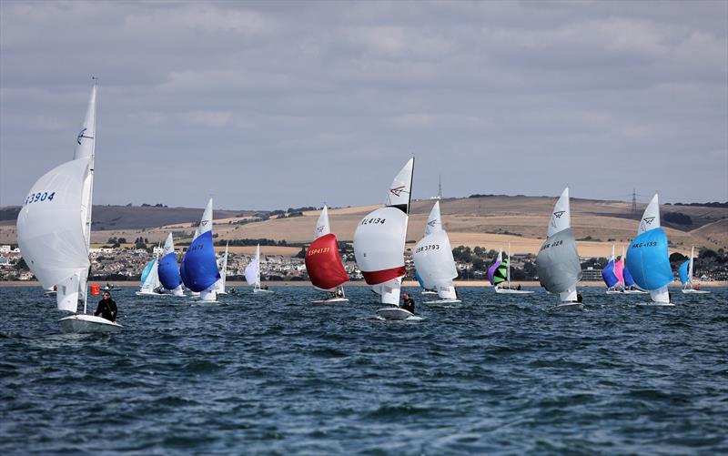 Race 9 finish on day 5 of the 2025 Flying Fifteen Worlds at the WPNSA photo copyright Mark Jardine taken at Weymouth & Portland National Sailing Academy and featuring the Flying Fifteen class
