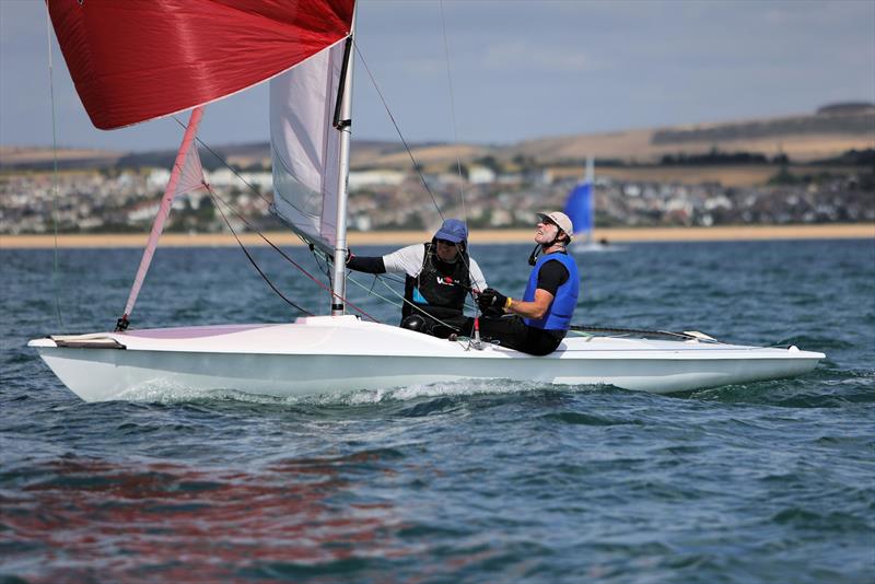 Race 9 - AUS 4105 on the first downwind leg on day 5 of the 2025 Flying Fifteen Worlds at the WPNSA photo copyright Mark Jardine taken at Weymouth & Portland National Sailing Academy and featuring the Flying Fifteen class