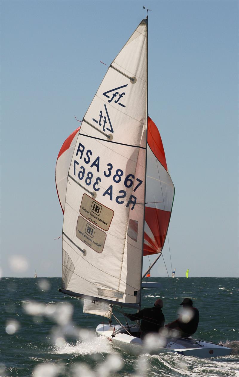Siyanda Vato and Nhlanhla ‘Lucky' Pakathi are pictured gliding out to sea during a recent Flying 15 Nationals. The two were regular features in the Flying 15 line up and are now making names for themselves on big boats in international waters photo copyright Sophie Thompson taken at Aeolians Club and featuring the Flying Fifteen class